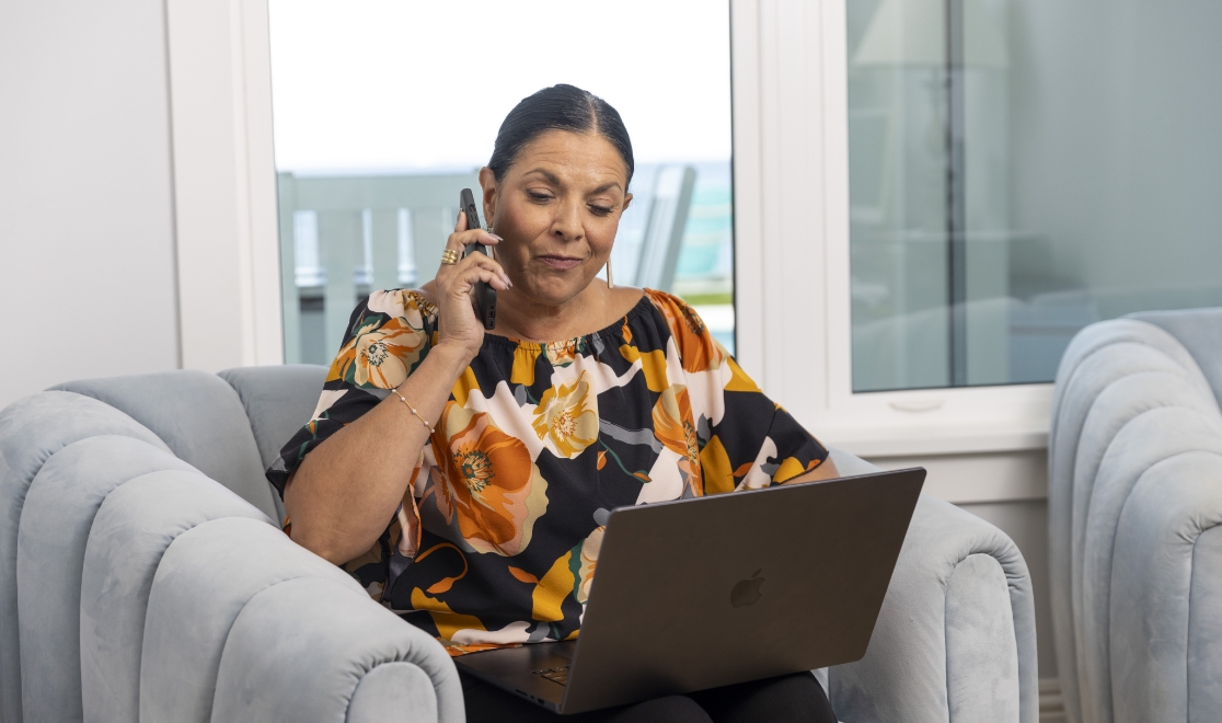 why-choose_callout9 Customer on the phone with Sharp Energy